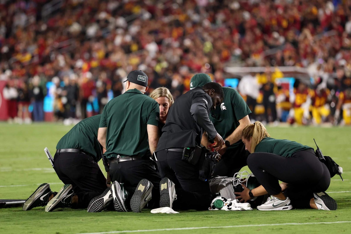 Michigan State's Wayne Matthews III carted off field after collision against USC